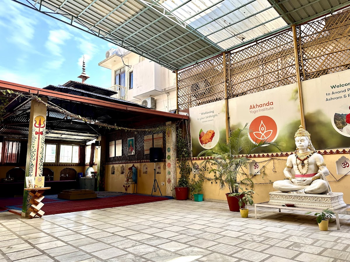 Ashram courtyard with thatched gazebo